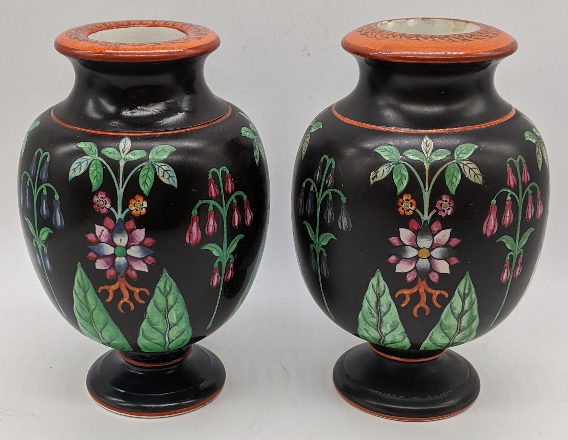 Null A pair of Victorian porcelain black ground vases floral decor with red band&hellip;