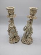 Null A pair of 19th century German porcelain candlesticks, H.19cm