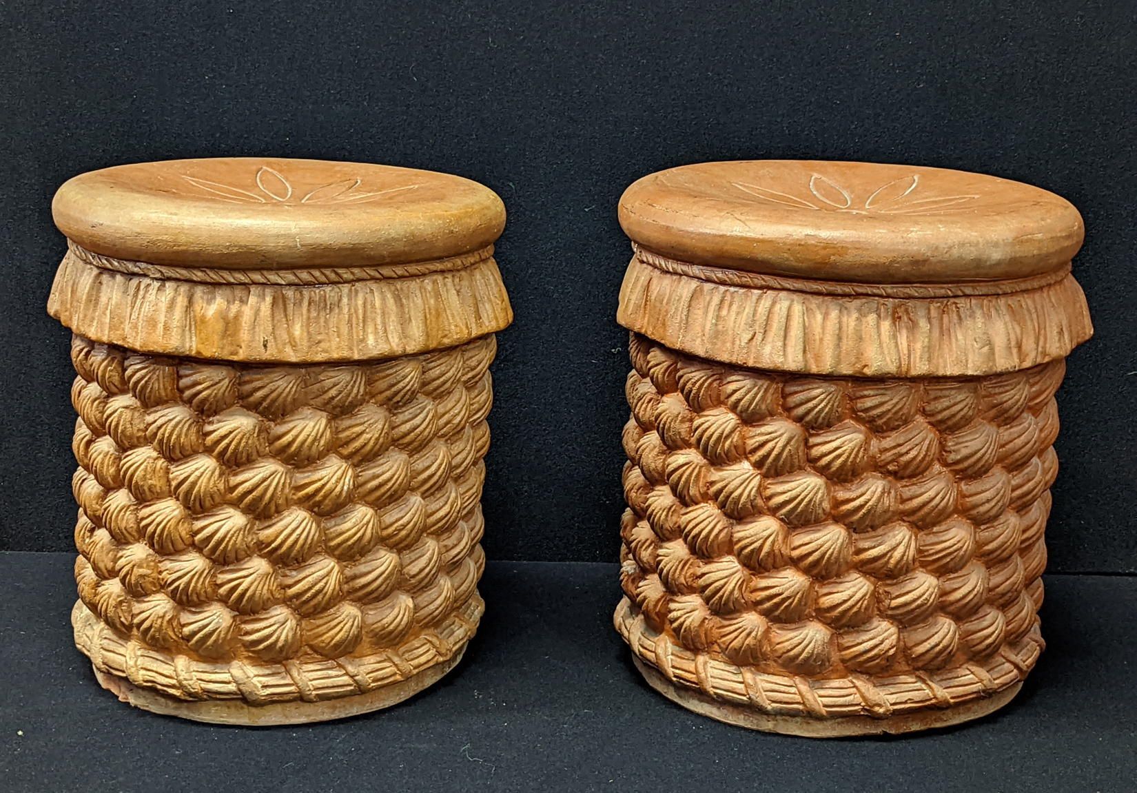 Null A pair of terracotta stools with shell style decor, H.36cm
