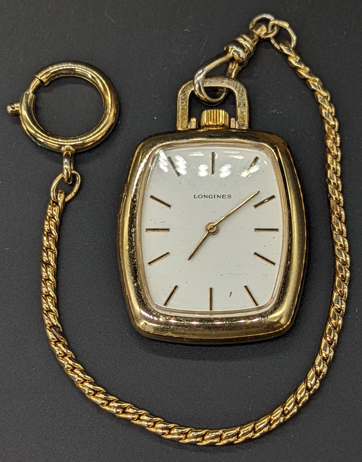 LONGINES A Longines gold-filled pendant pocket watch on a gold plated chain