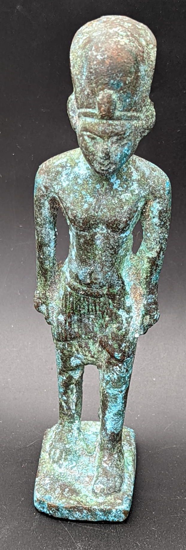 Null An early Egyptian bronze figure, antiquities interest, H.14cm