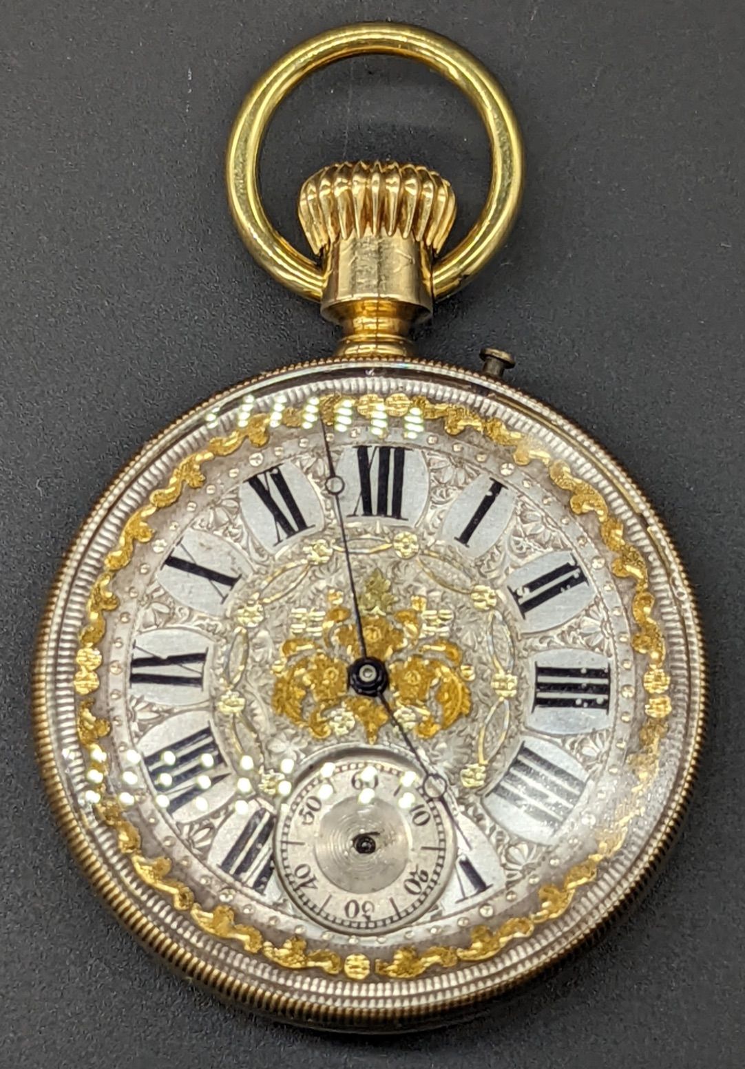 Null An 18ct gold skeleton pocket watch, silvered dial elaborately decorated wit&hellip;