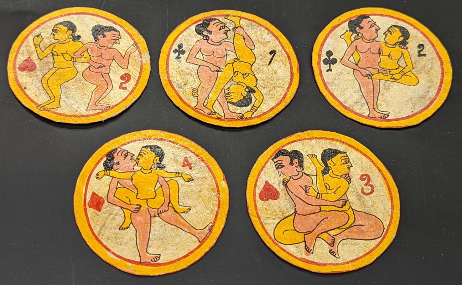 Null A set of five 19th century Indian erotic playing cards, D.7cm