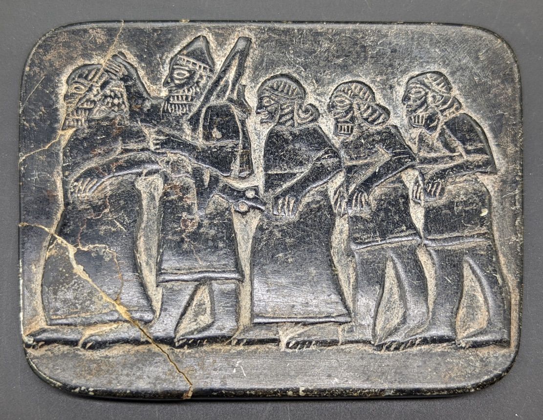 Null Assyrian hardstone depicting figural scene, 10cm x 8.5cm