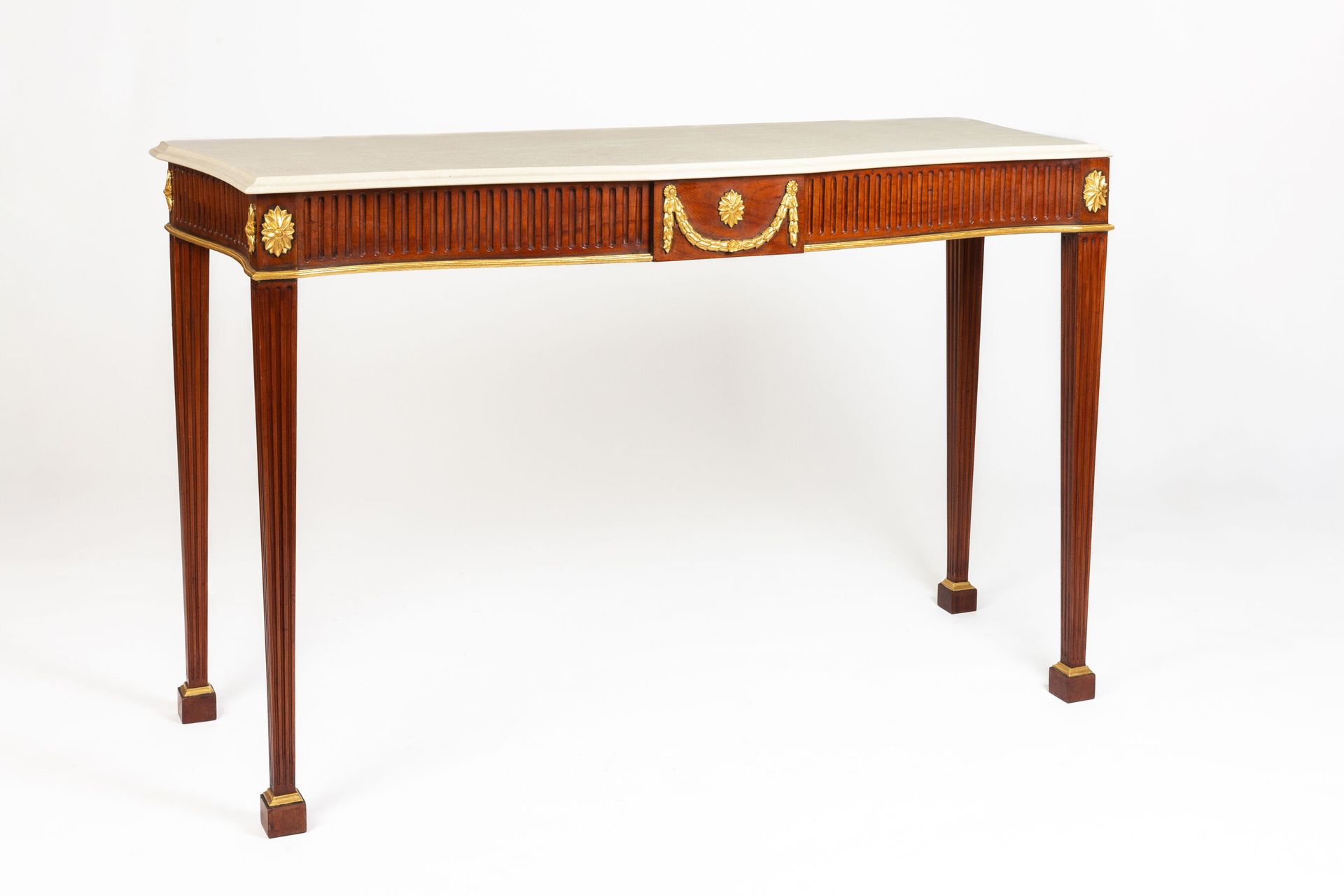 Null Pair of mahogany and gilded wood consoles with belt and fluted legs. 
Polis&hellip;
