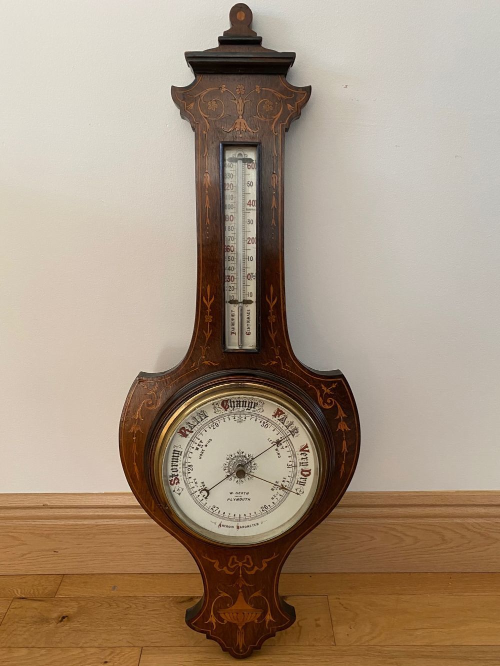 A GOOD QUALITY ROSEWOOD INLAID ANEROID BAROMETER, with porcelain dial, a fine ex&hellip;