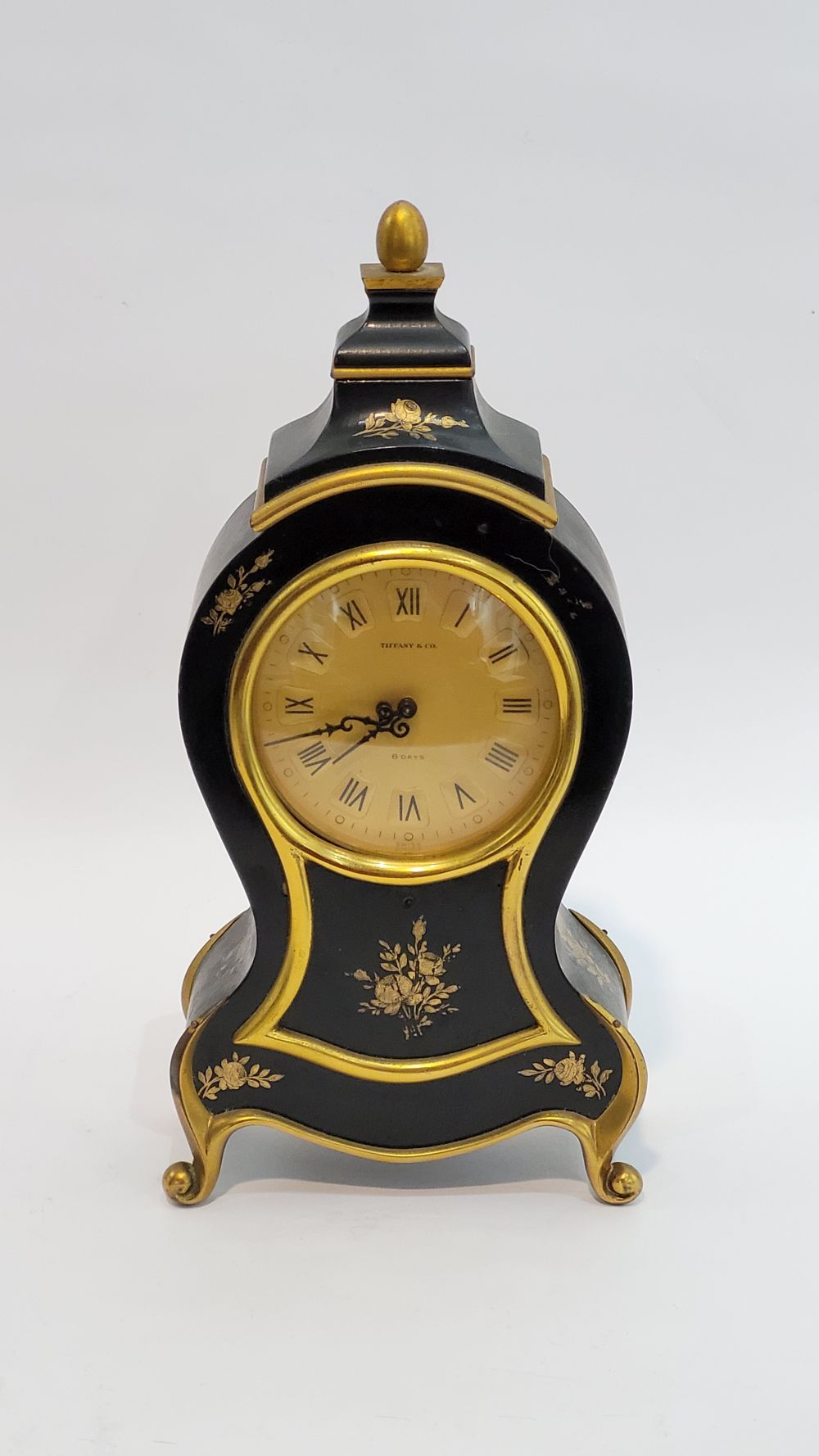A TIFFANY & CO. 8 DAY MANTEL CLOCK, with ebonised wood with gilt floral details,&hellip;