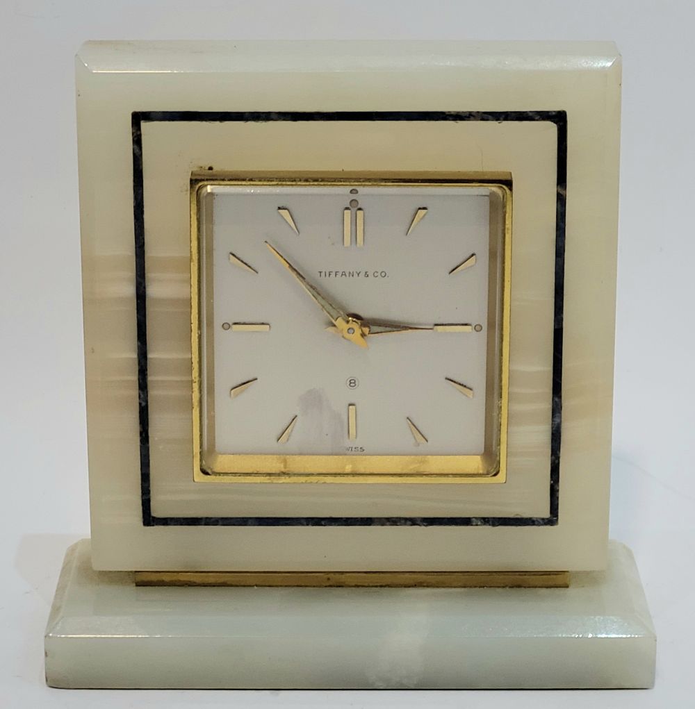 A TIFFANY & CO. ANGELUS 8 DAY 15 JEWEL MANTEL CLOCK, set in a marble stone frame&hellip;