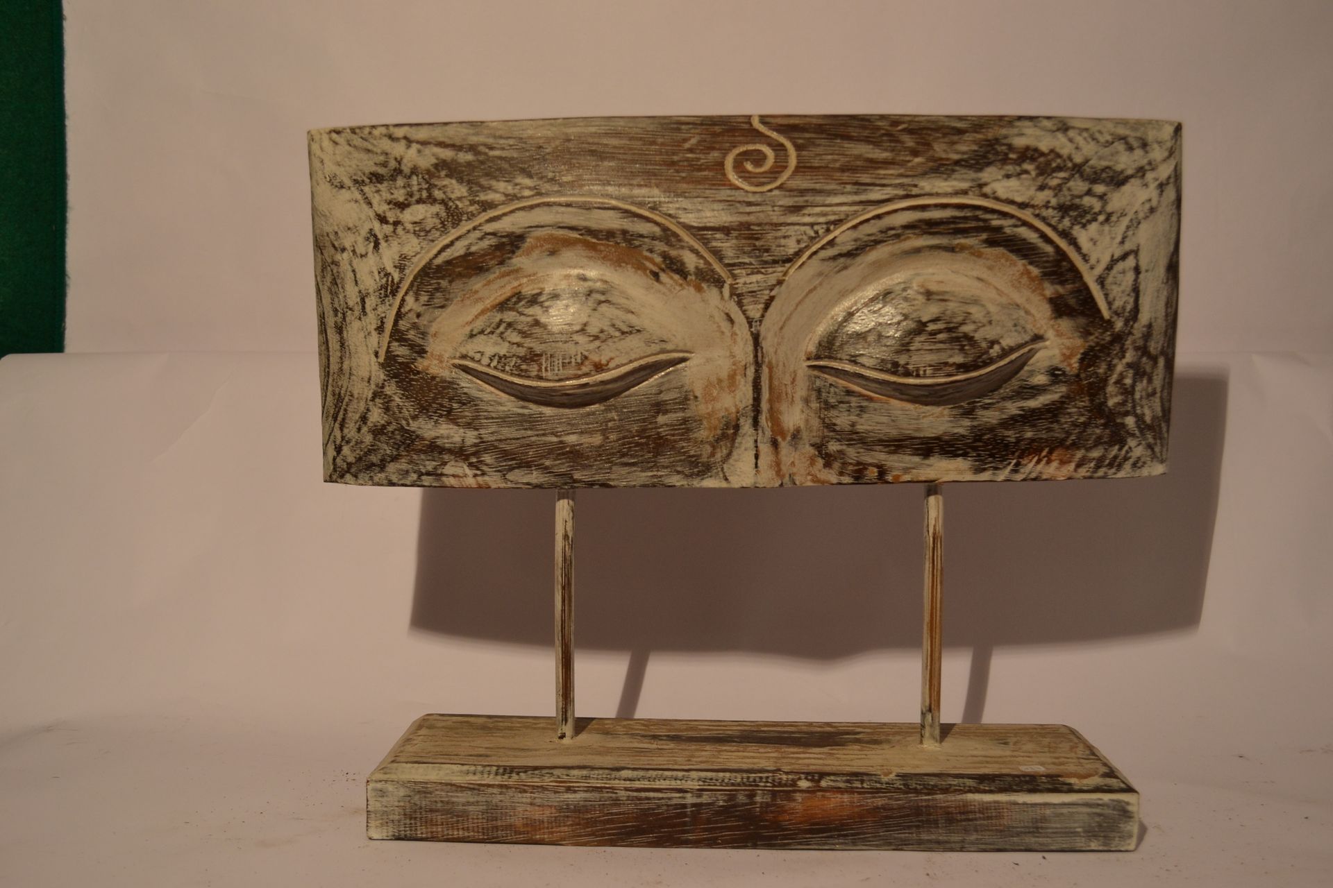Null Carved panel on a base, Buddha's eyes motif

Exotic wood, white patina

 Ba&hellip;
