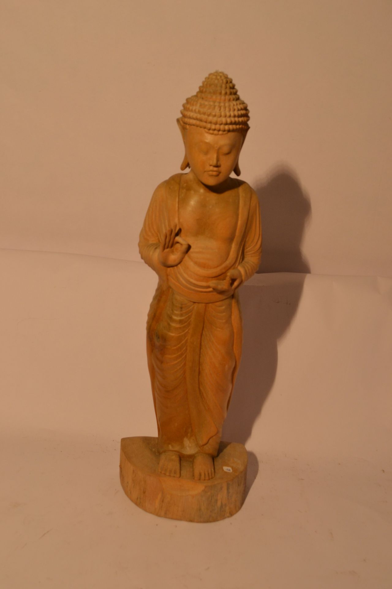 Null Standing Buddha.

Wood hibiscus

 67 x 15 x 11 cm

weight : 1,5 Kg.