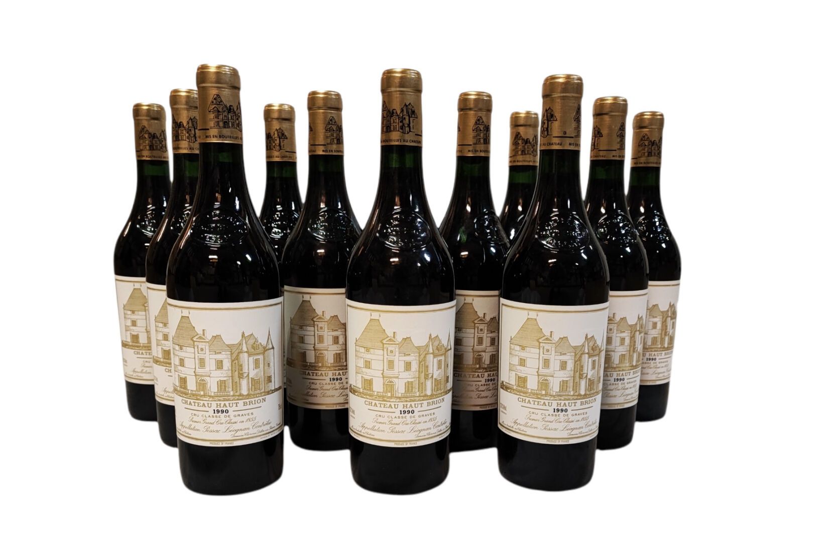 Null Château Haut-Brion 1990, caisse en bois de 12 bouteilles, bon niveau