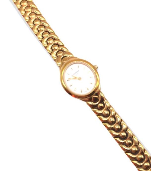 Null TISSOT, montre de dame en métal doré, cadran ovale à fond blanc, bracelet a&hellip;