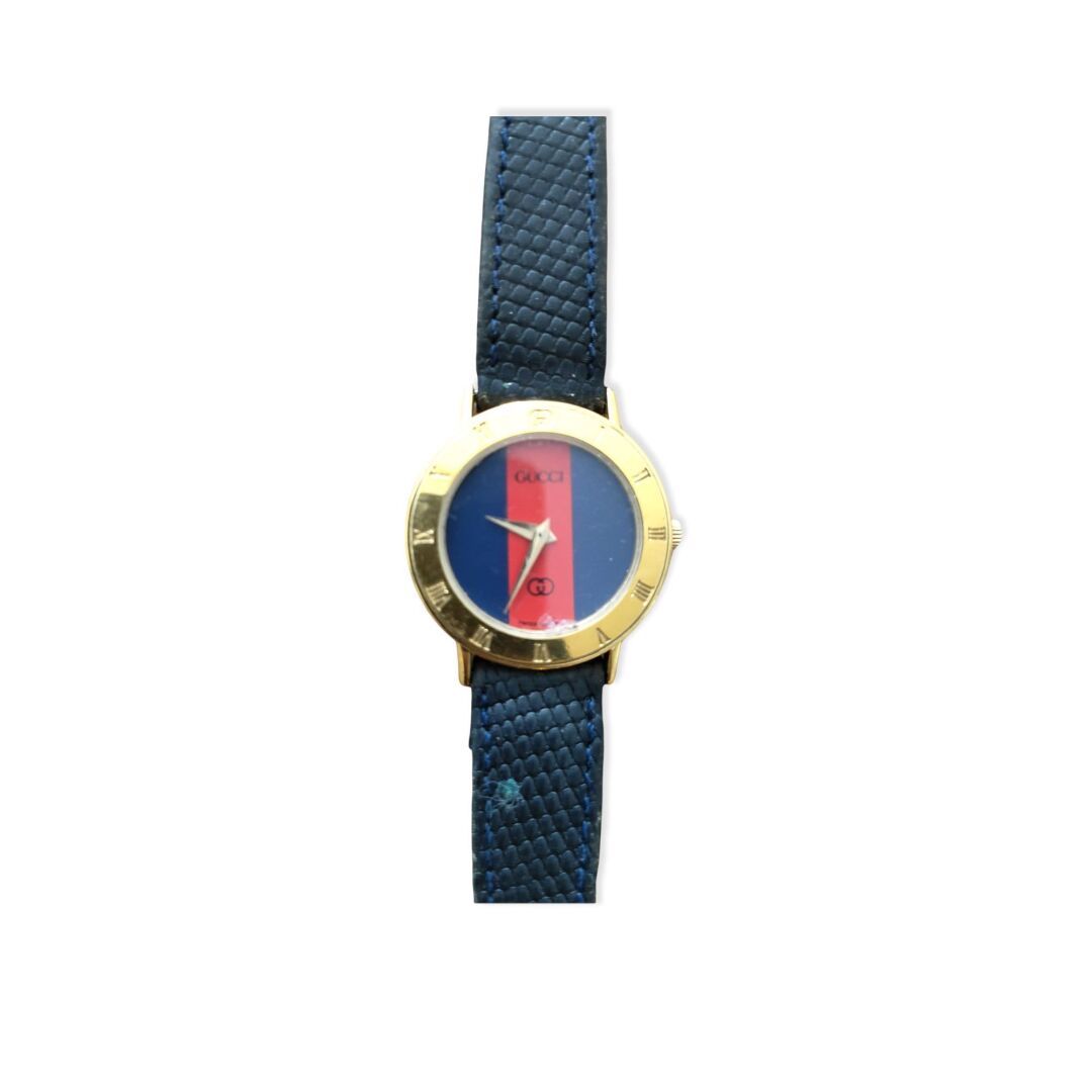 Null GUCCI, montre en métal doré, cadran rond à fond bleu et rouge, bracelet en &hellip;