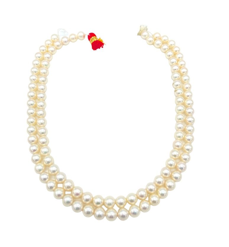 Null 两串Akoya养殖珍珠，在钢丝上，没有组装，没有扣子，49和50颗珍珠（直径为8毫米）