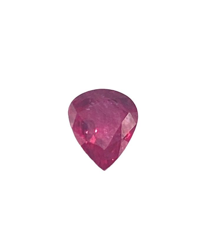 Null Heated ruby, on paper, faceted drop size, approx. 2.50 cts