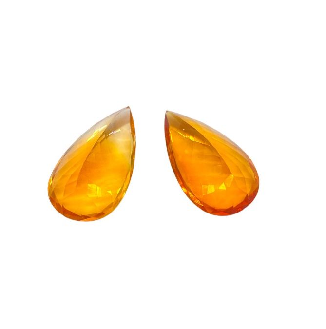 Null Two citrines on paper, faceted pear size, total approx. 40 cts