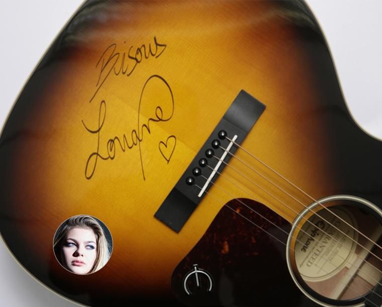 Louane Louane offre l'une de ses guitares.
Guitare acoustique de marque EPIPHONE&hellip;