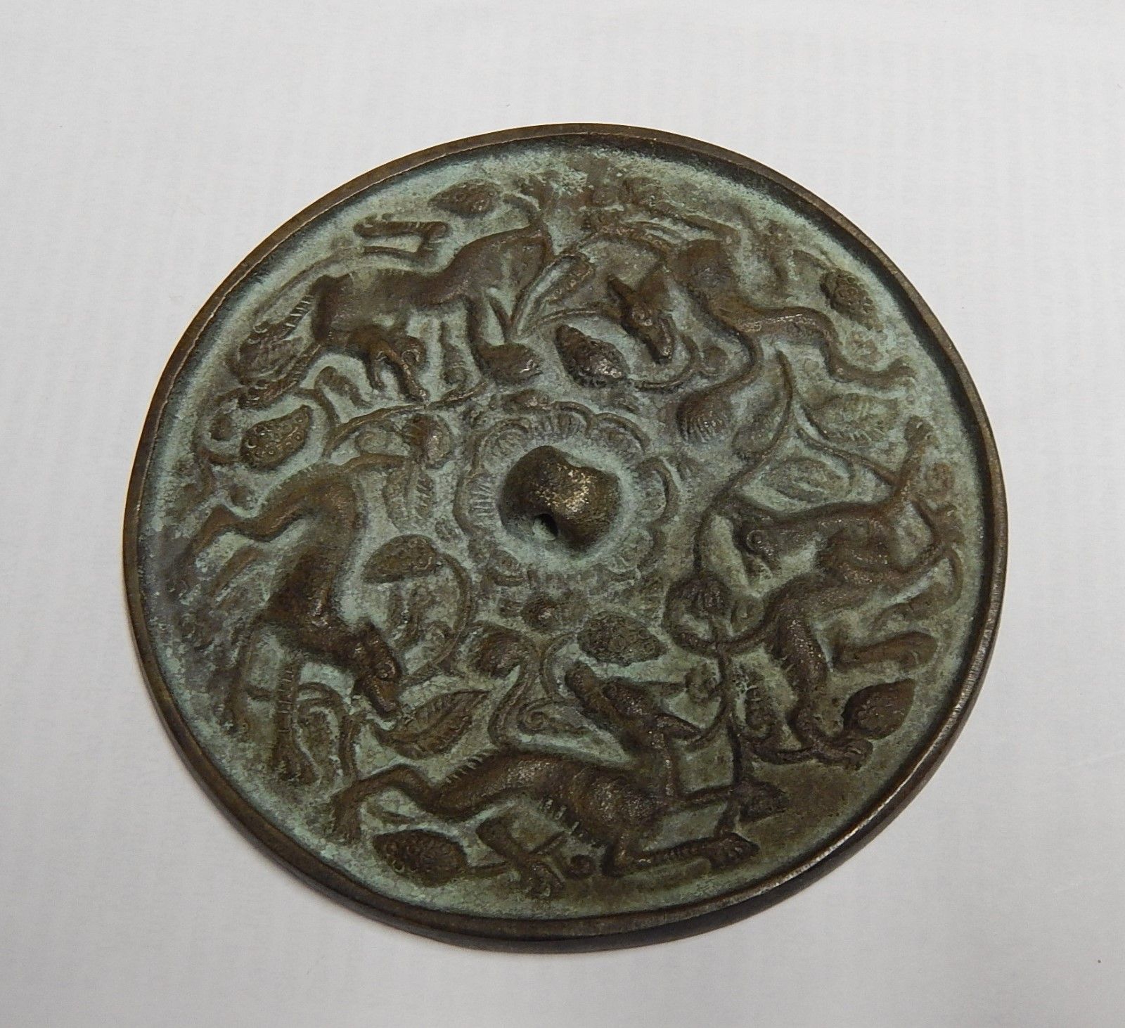 Null Mirror,Bronze with figural half reliefs,diameter 11,8cm,China,Ming Dynasty