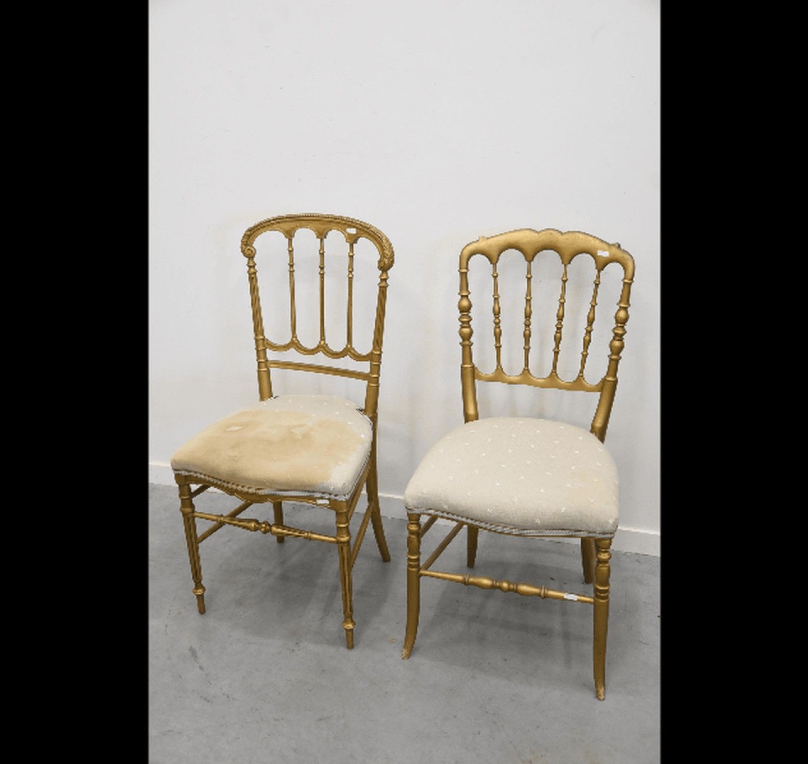 Null Two different armchairs,painted in gold,around 1900,together