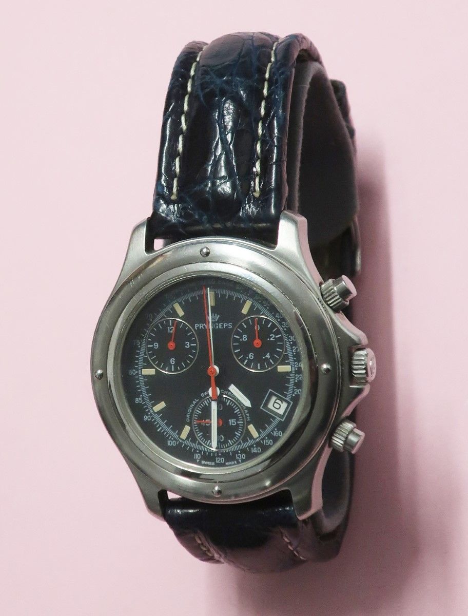 Null Poyngeps chronograph with black leather strap, with slight signs of wear