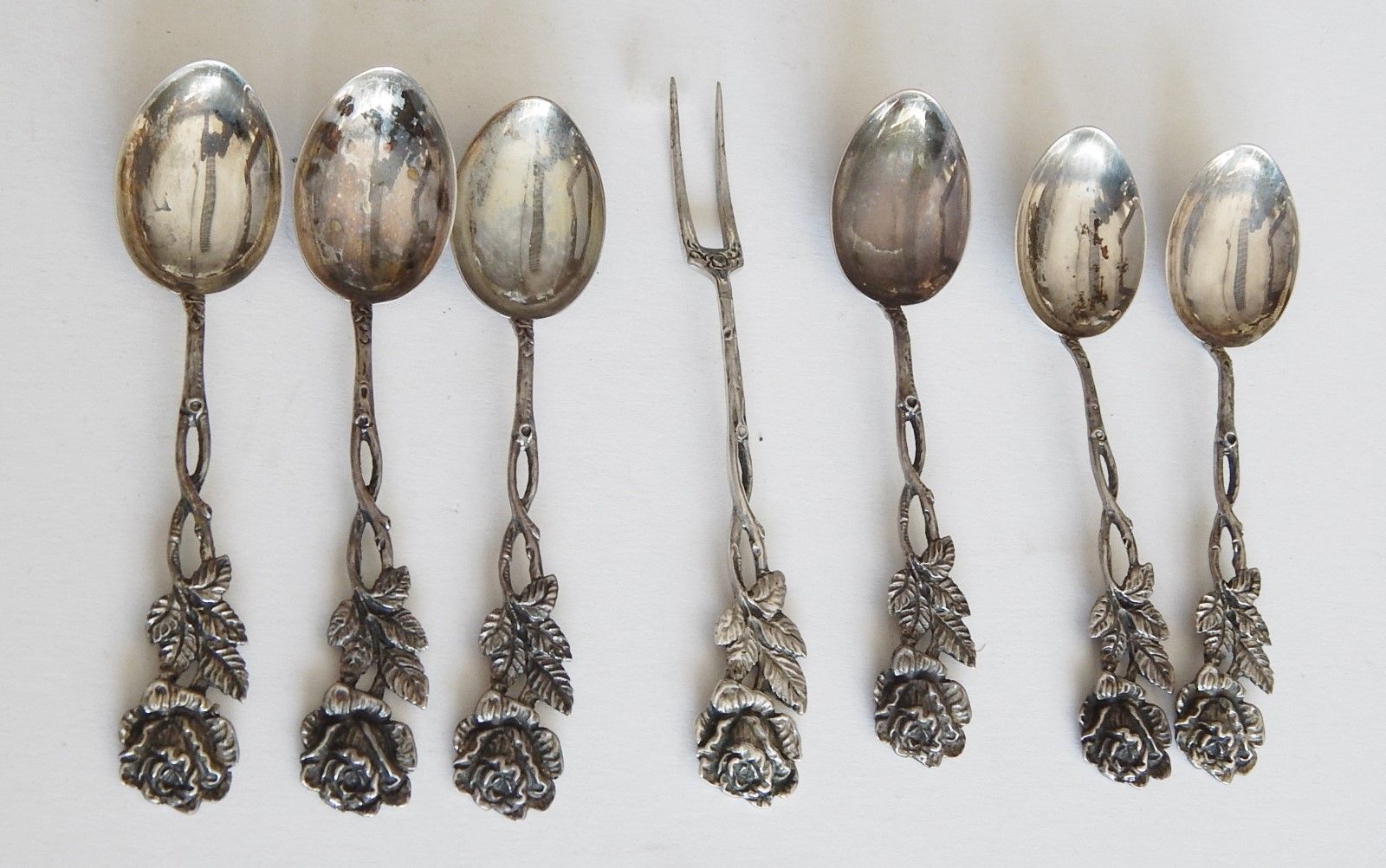 Null 6 coffee spoons and 1 fork,Heidenheim rose,835 silver,together