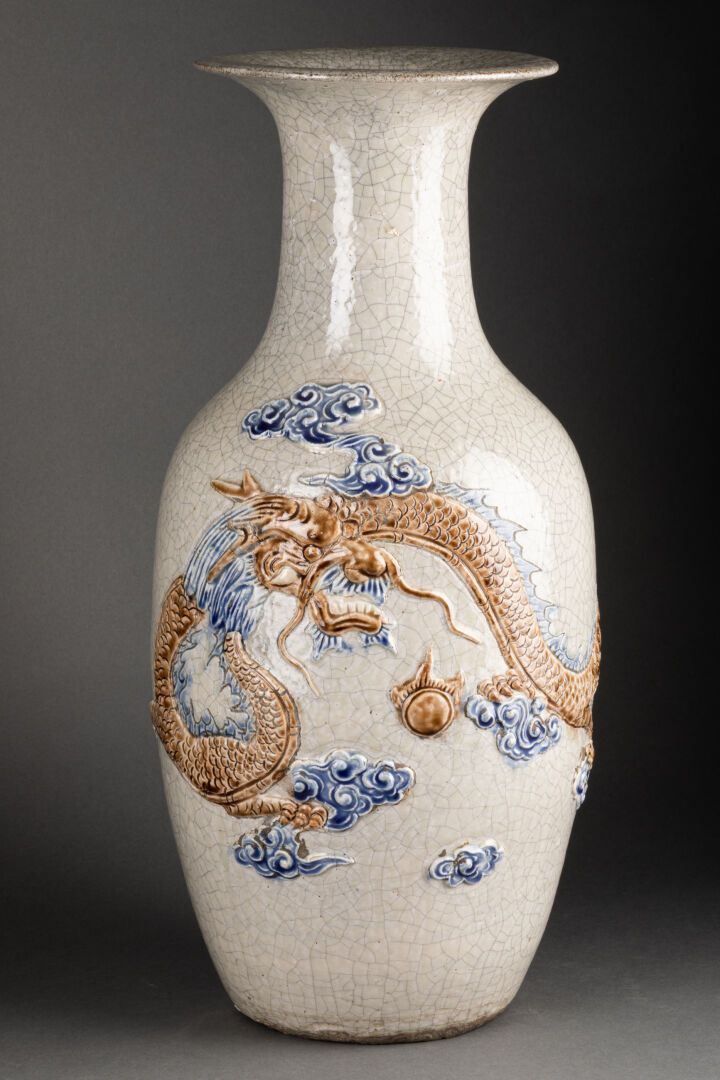 VIETNAM - Vers 1900 VASE with relief decoration of a dragon chasing the sacred p&hellip;