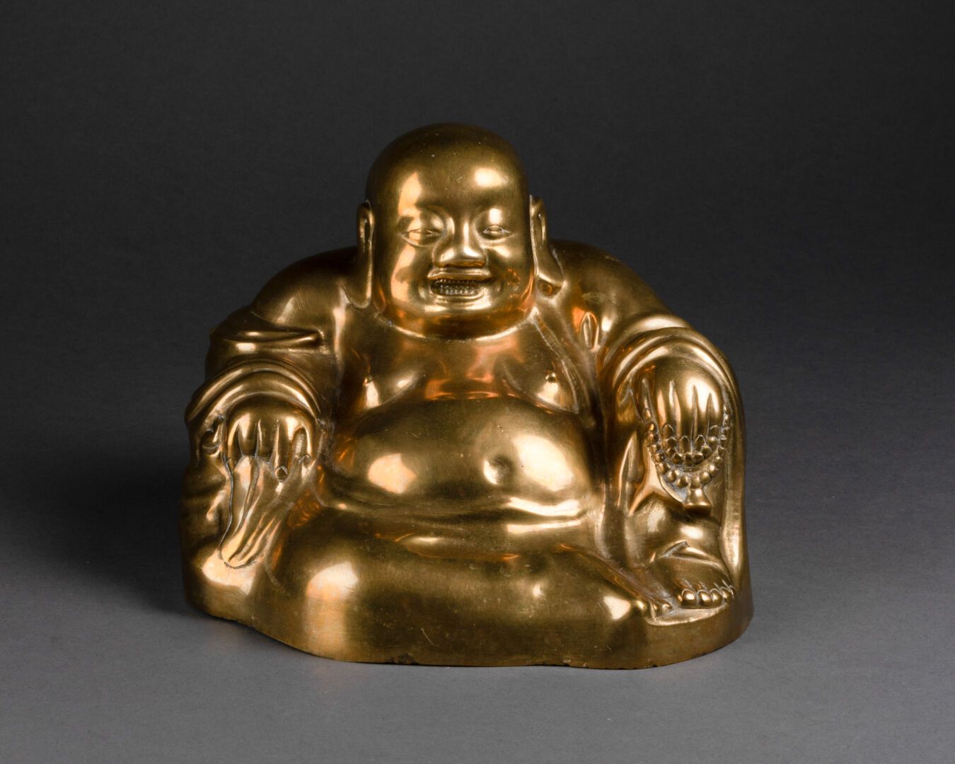 CHINE - Vers 1900 BUDAI in a position of royal relaxation 

Polished bronze 

H.&hellip;