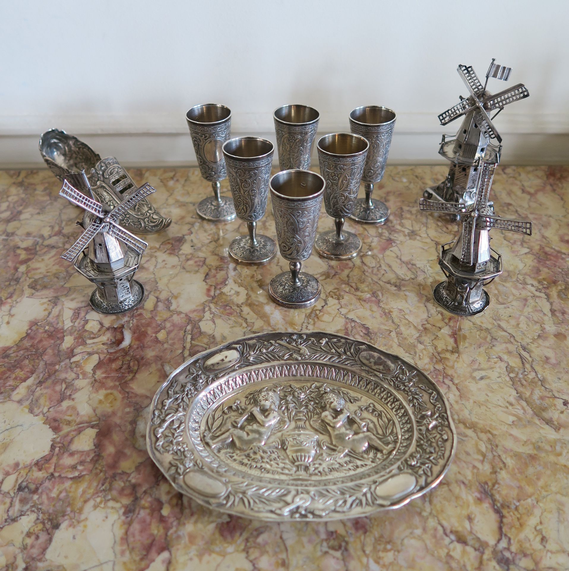 Null Silver set including three miniature mills, six cups engraved with foliage &hellip;