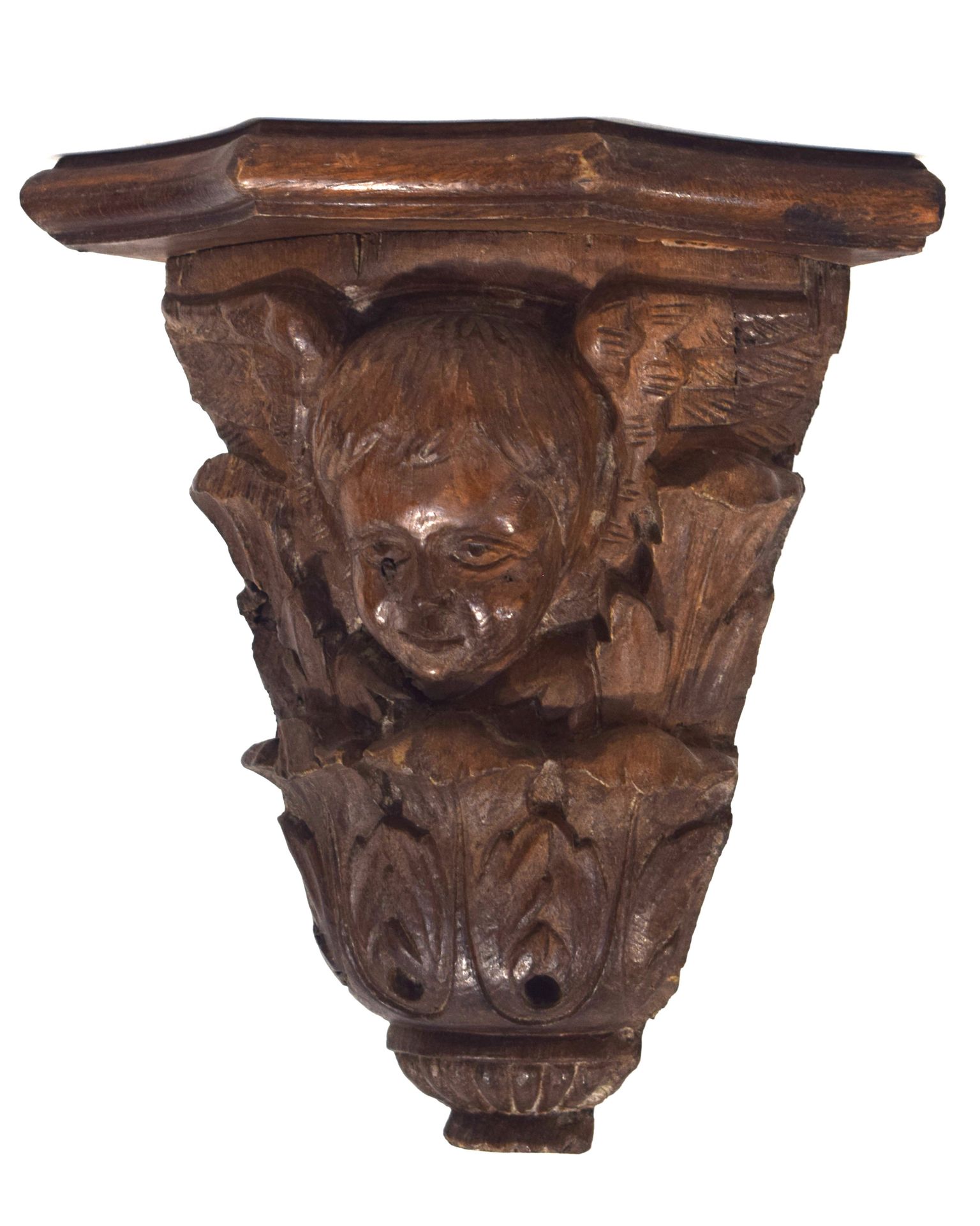 Null Wall base in oak carved with an angel's head, XIXth century, height 25 cm

&hellip;