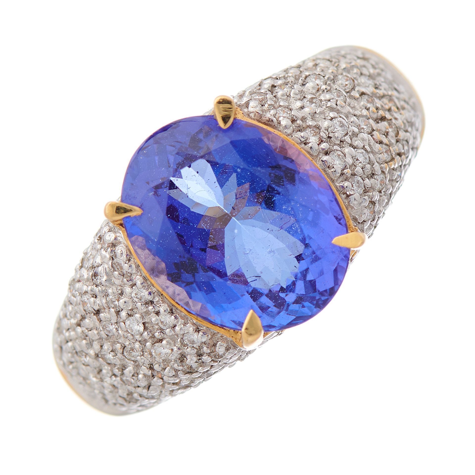 Null An 18ct gold tanzanite and brilliant-cut diamond dress ring, with pave-set &hellip;