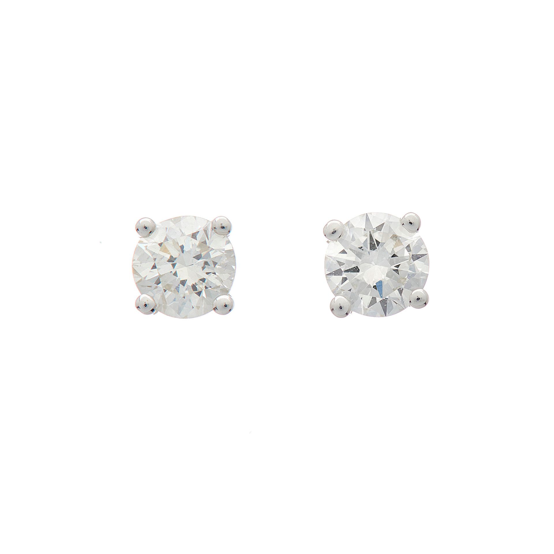Null A pair of brilliant-cut diamond stud earrings, with two mini reports from A&hellip;