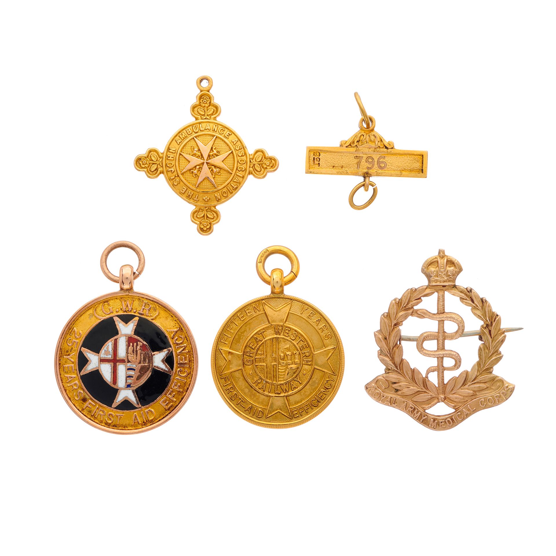 Null A selection of gold service medals and a brooch, one with enamel decoration&hellip;