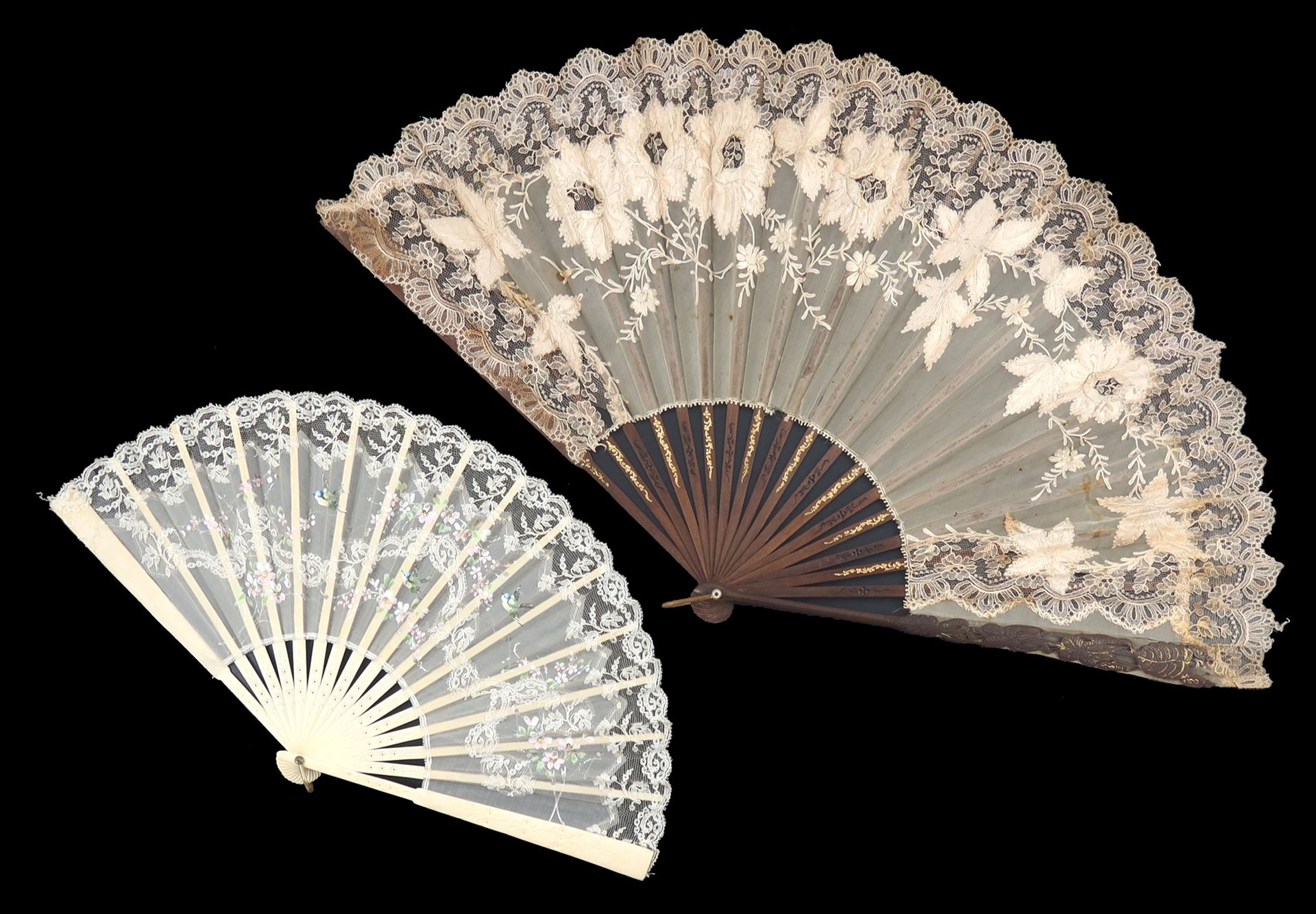 Null Two machine lace fans, the first a large wood fan with carved and shaped gu&hellip;