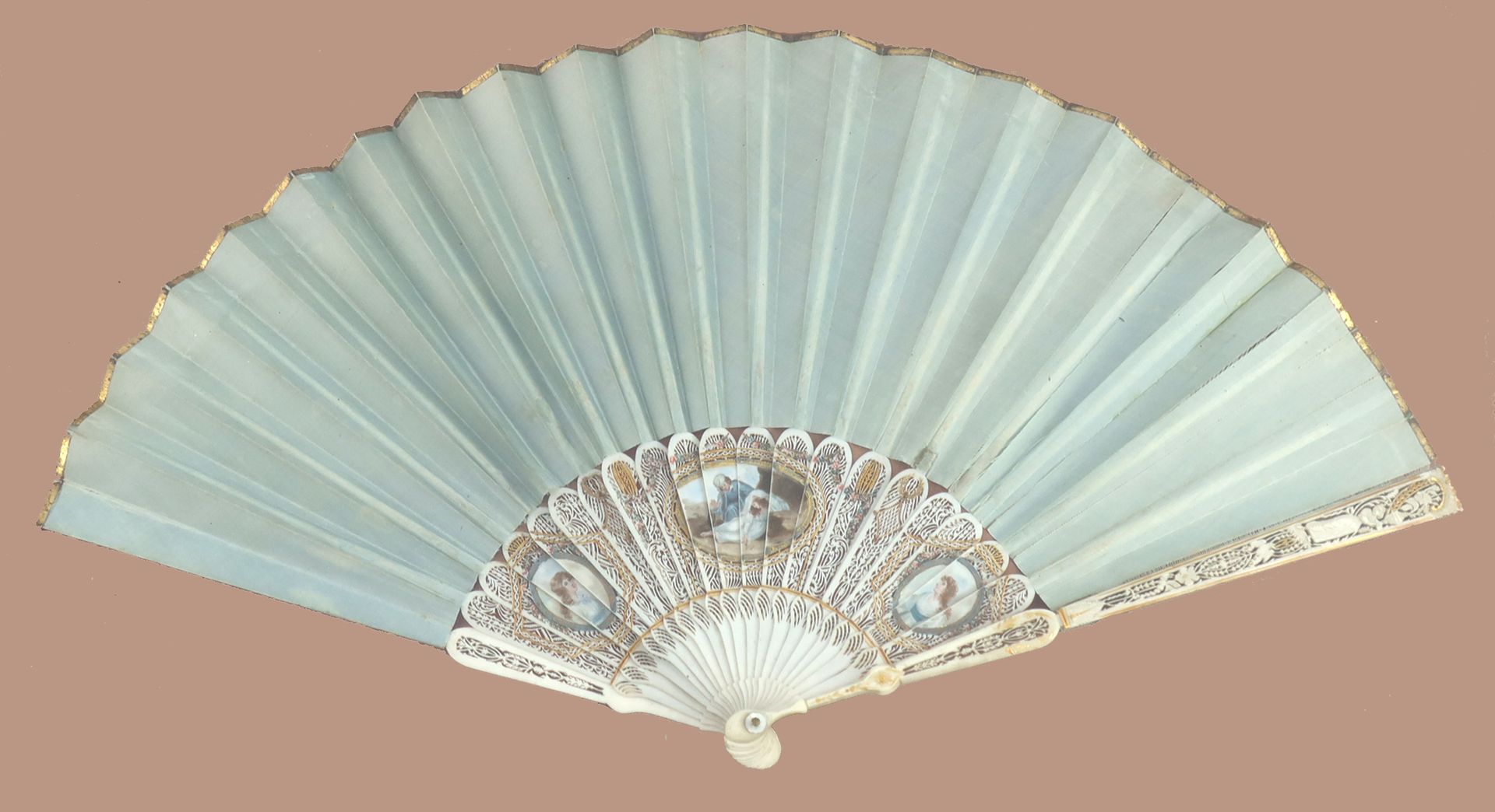 Null A slender 18th century ivory fan with sea green silk leaf, the monture fine&hellip;