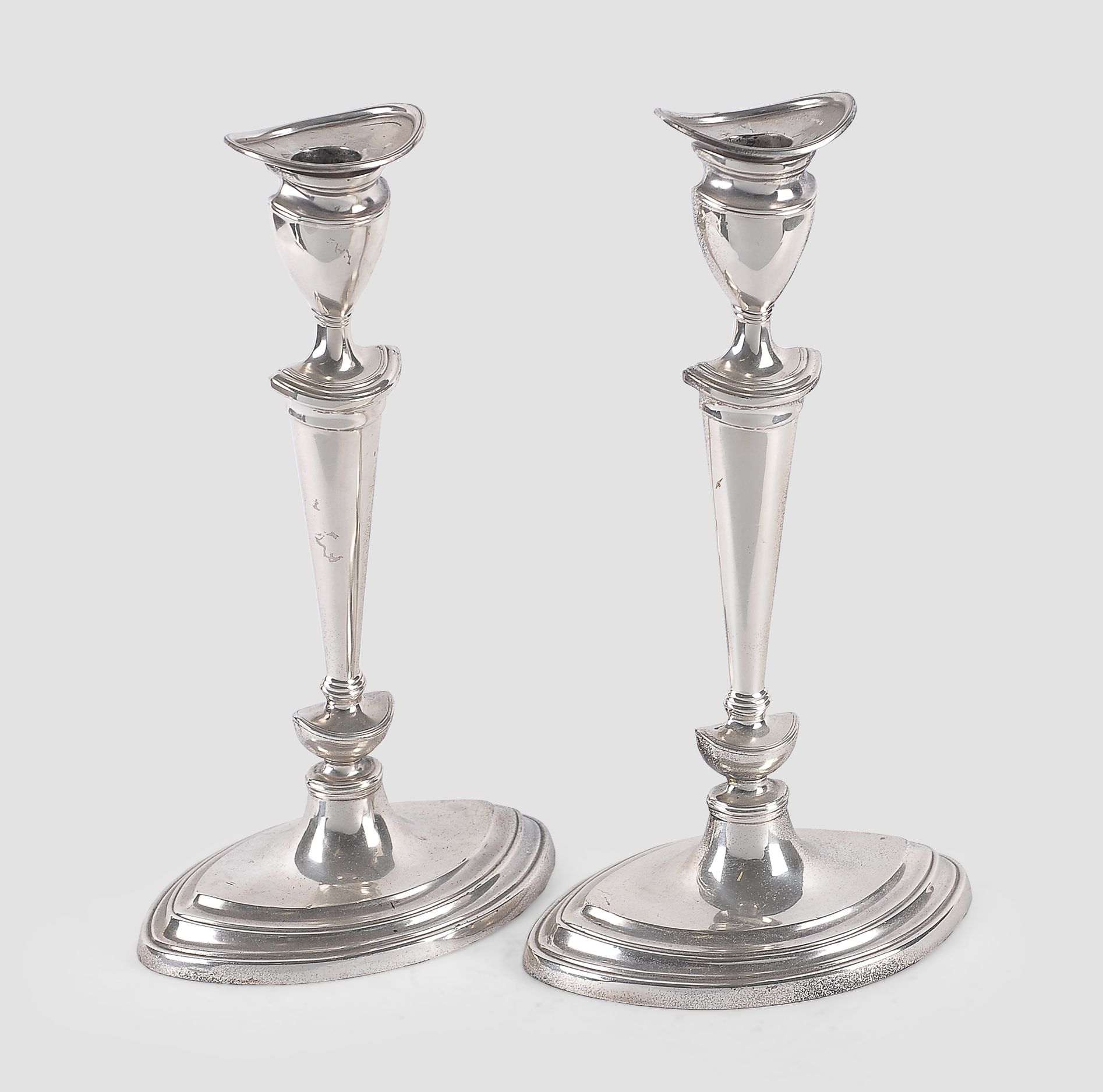 Null Pair silver candlesticks


England, ca. 1930/40


Silver with oval base, th&hellip;