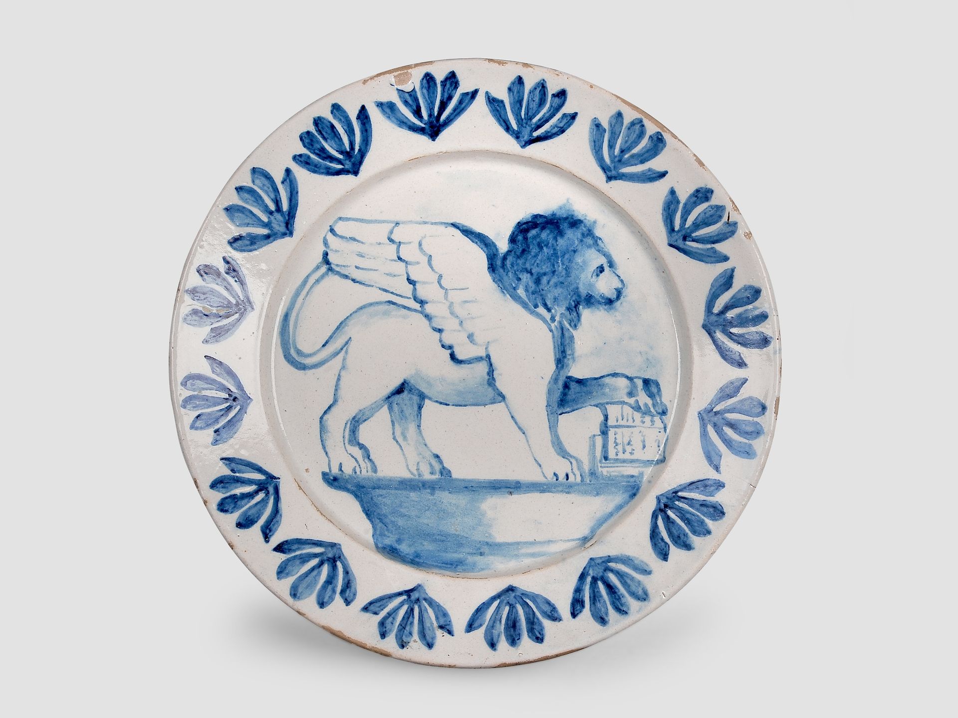 Null 盘子


辉石


19世纪


中间是威尼斯狮子的图案


33厘米