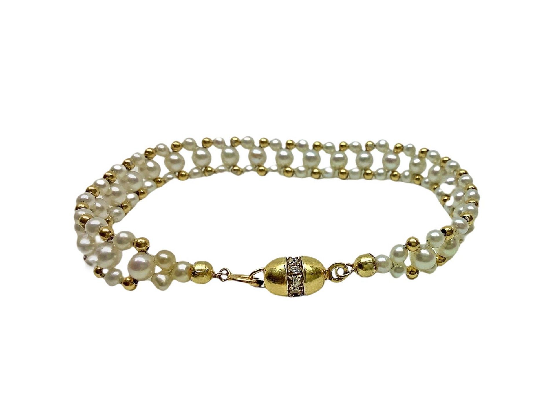 Null Bracelet en or jaune et perle de traitement 9.3 gr. Susta avec petits diama&hellip;