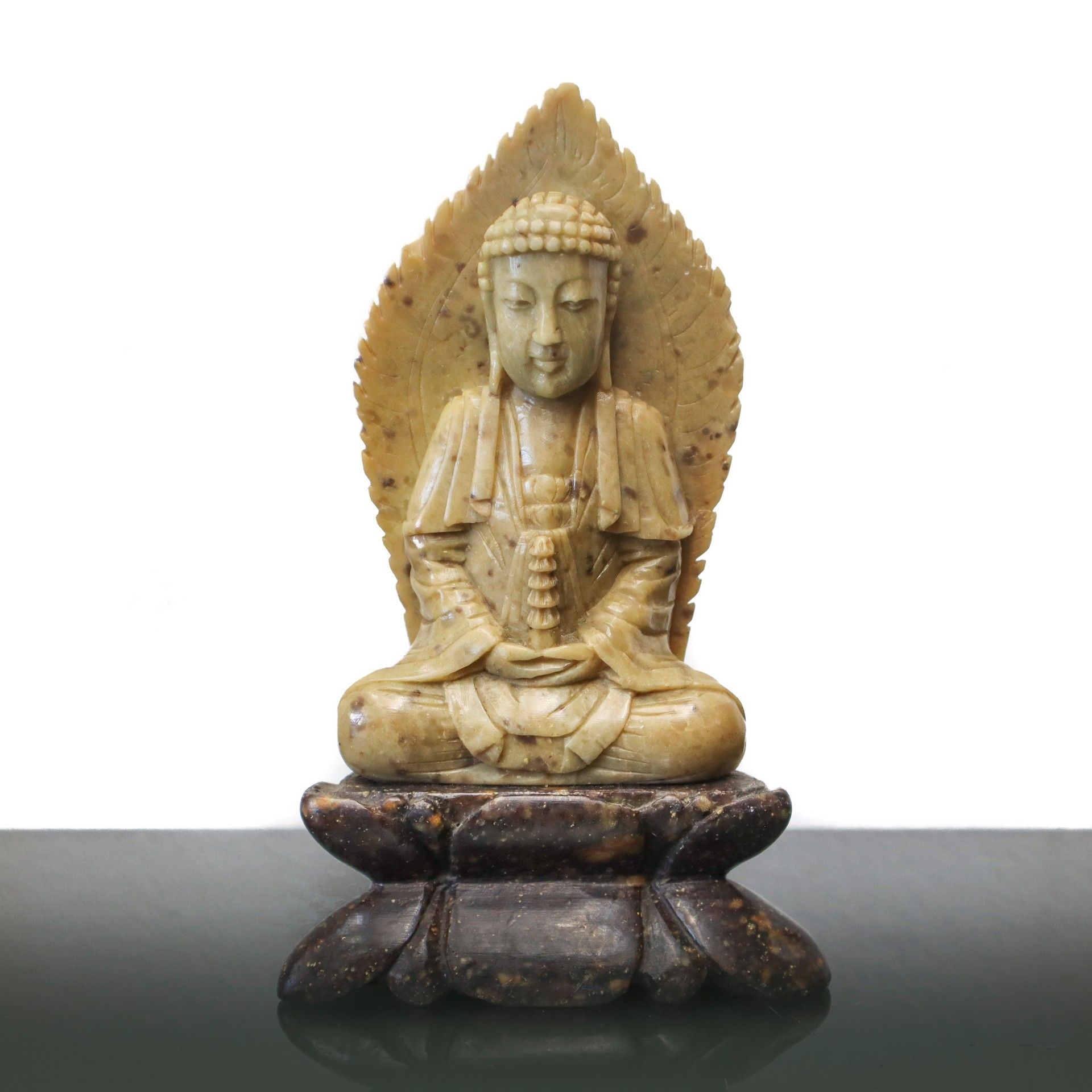 Null Soapstone Buddha, 20th century cm.14 base cm.9