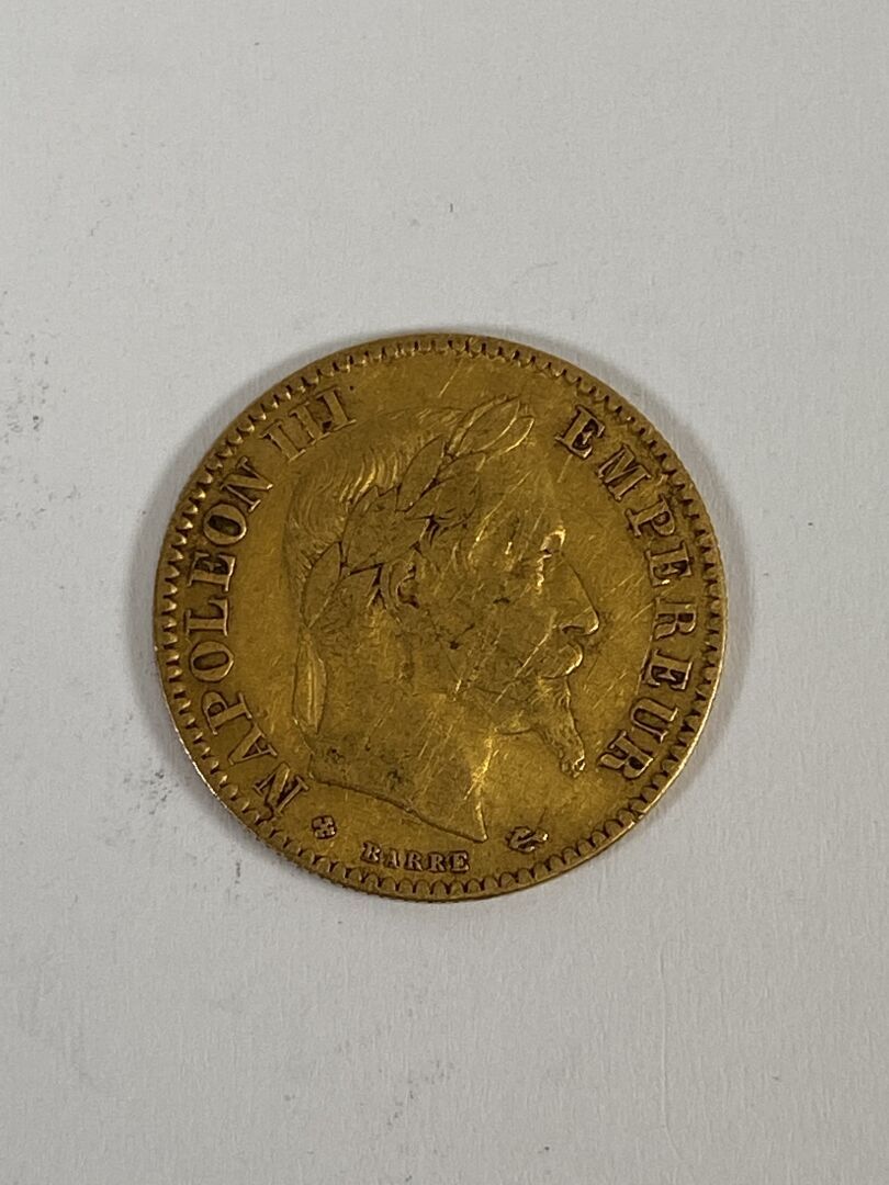 Null Coin of 10 francs in gold, Napoleon III head laurel, 1864.