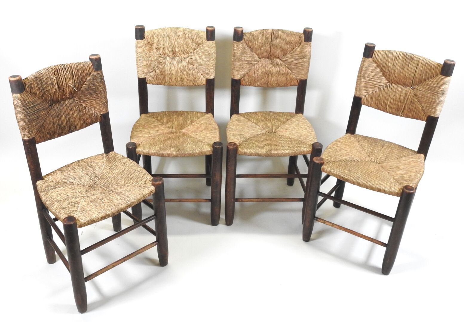 Null Charlotte PERRIAND (1903-1999).
Suite de quatre chaises Modèle dit Bauche, &hellip;