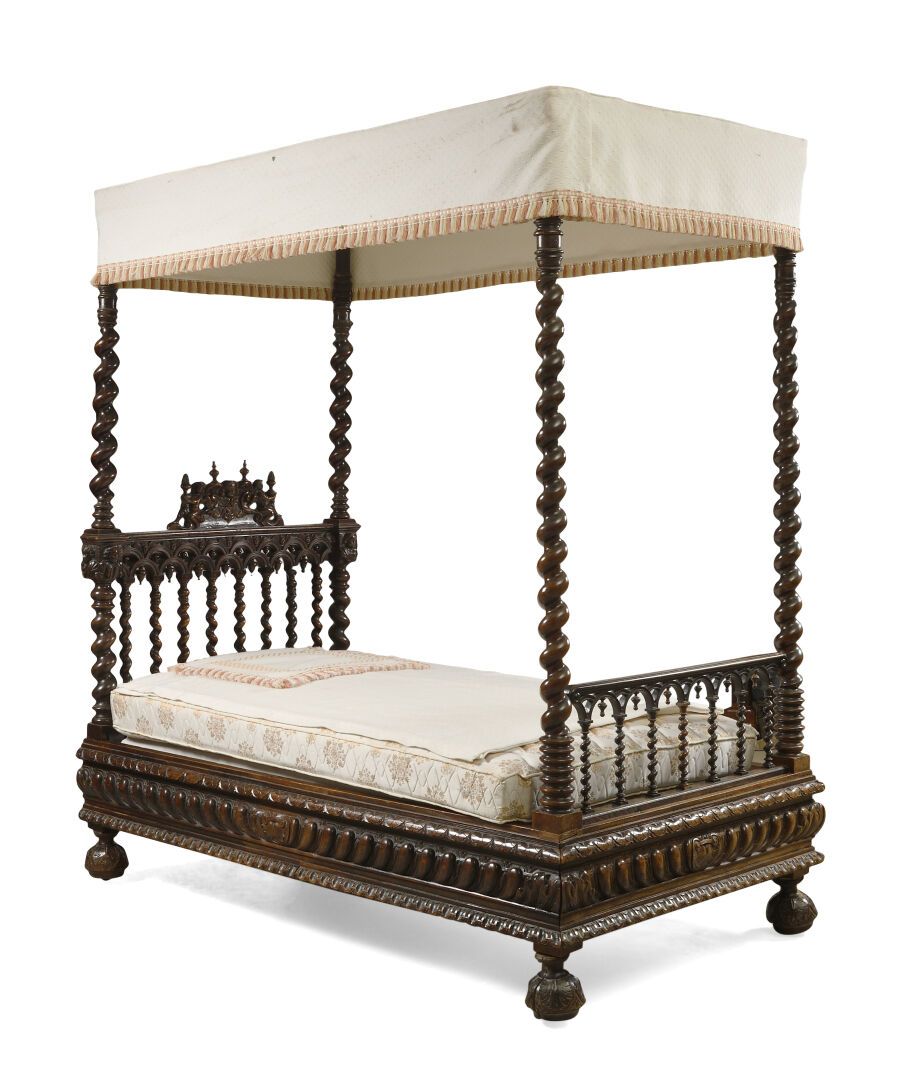 Null Rectangular canopy bed in walnut turned, molded and carved, the uprights in&hellip;