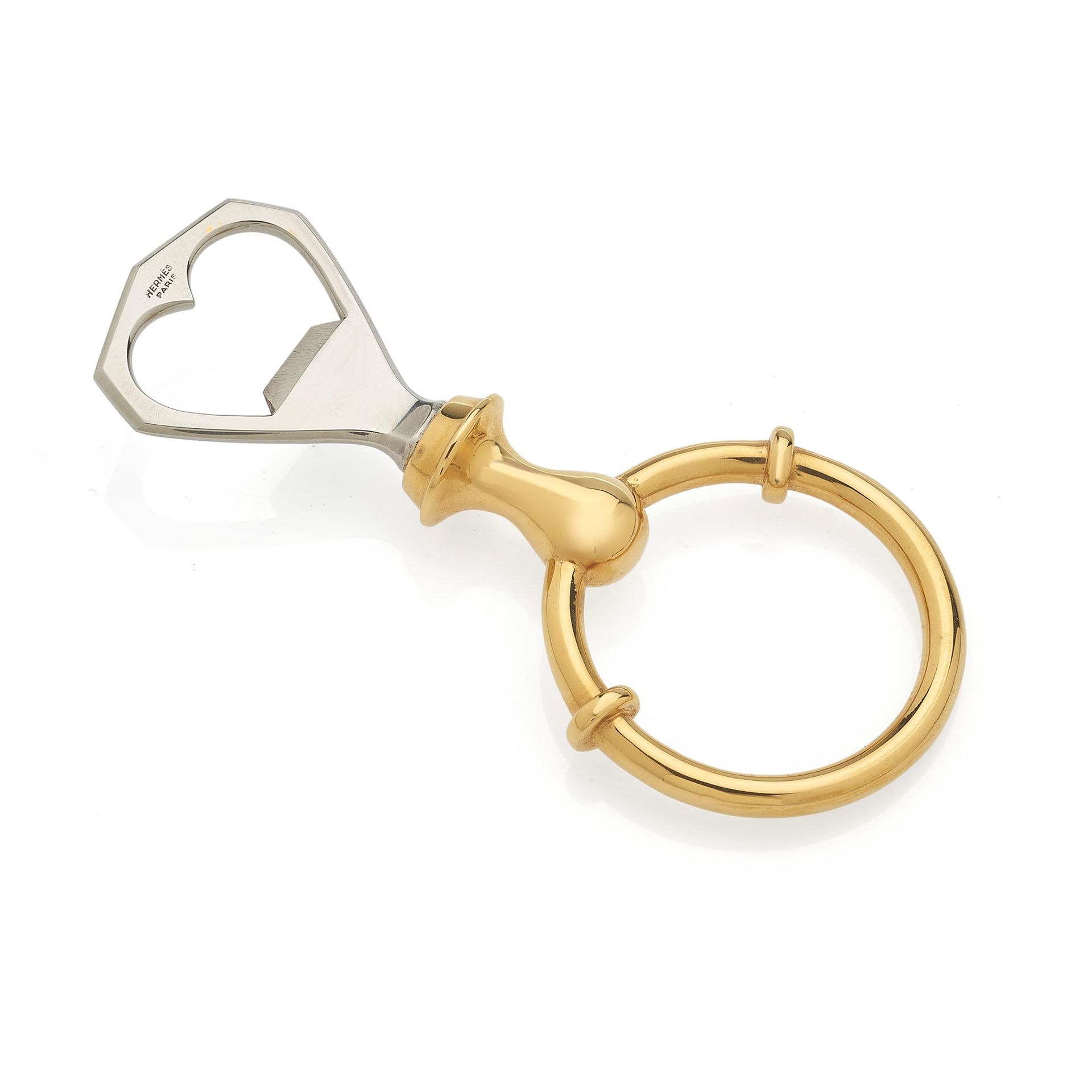 HERMES Abrebotellas de acero dorado y plateado de Hermès. Completa con el embrag&hellip;
