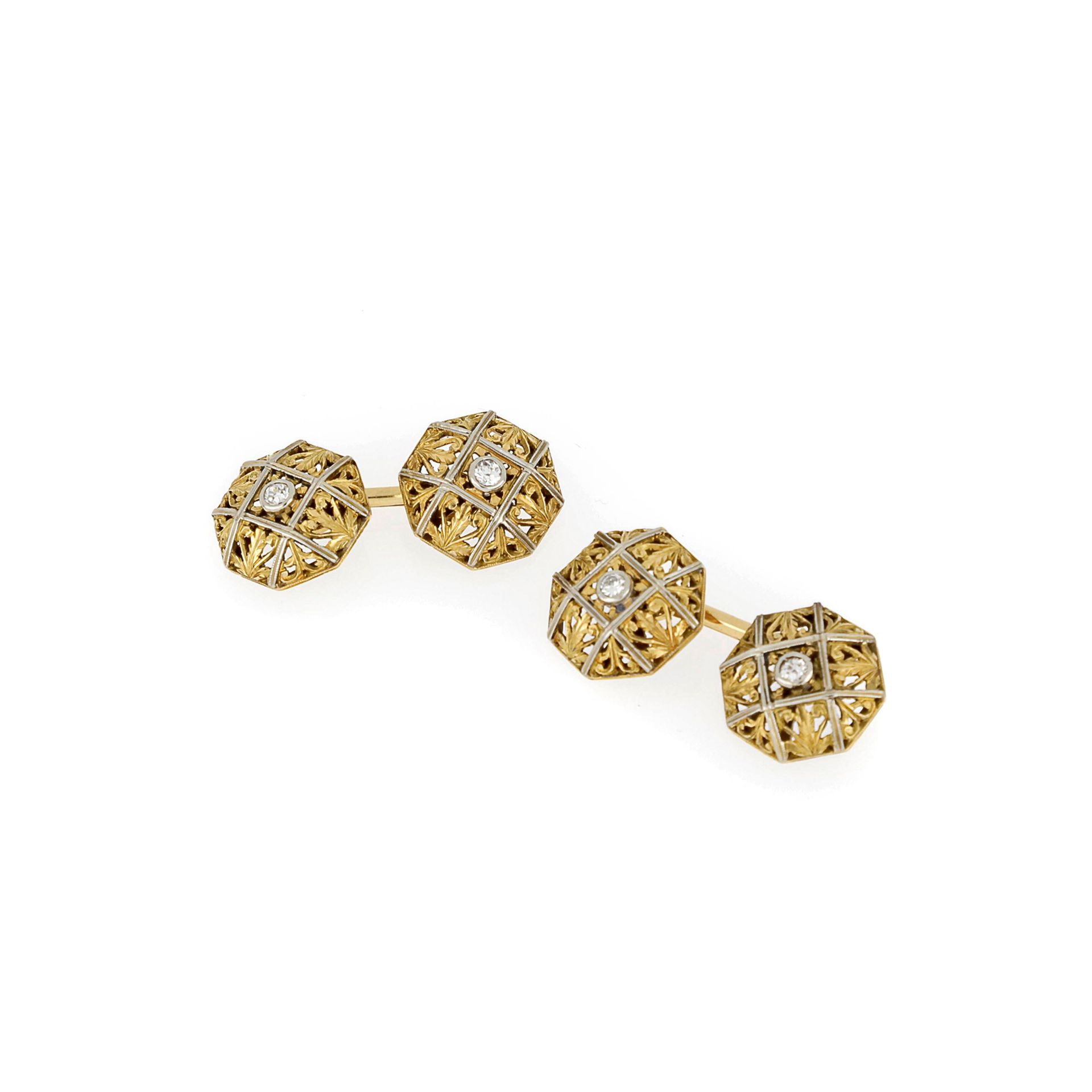 Null 18K黄金和白金袖扣，中间有一颗钻石 直径约1.3厘米，重量8.24克



18K黄金和白金镶钻。