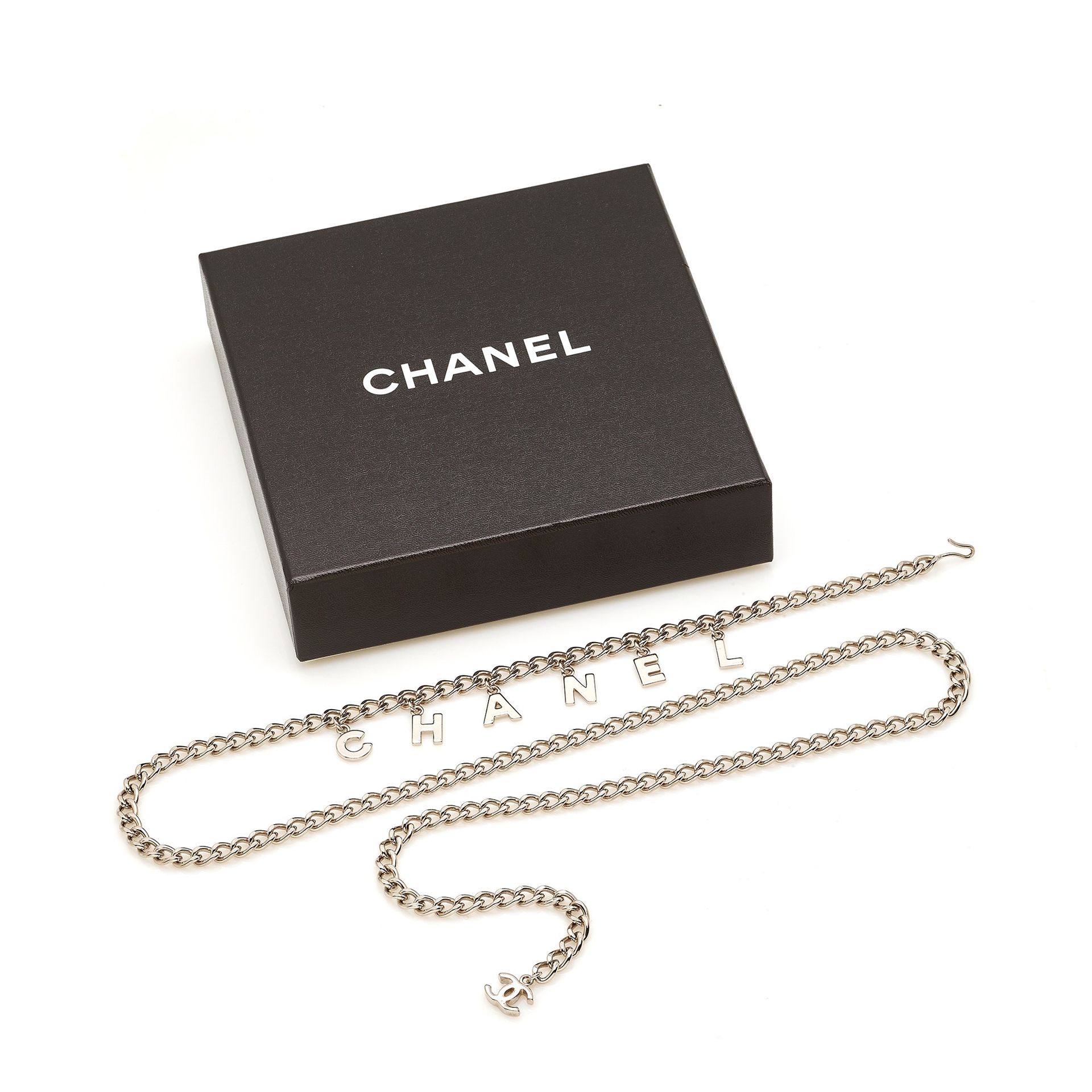 Chanel belt in silver-plated metal with letters making u…