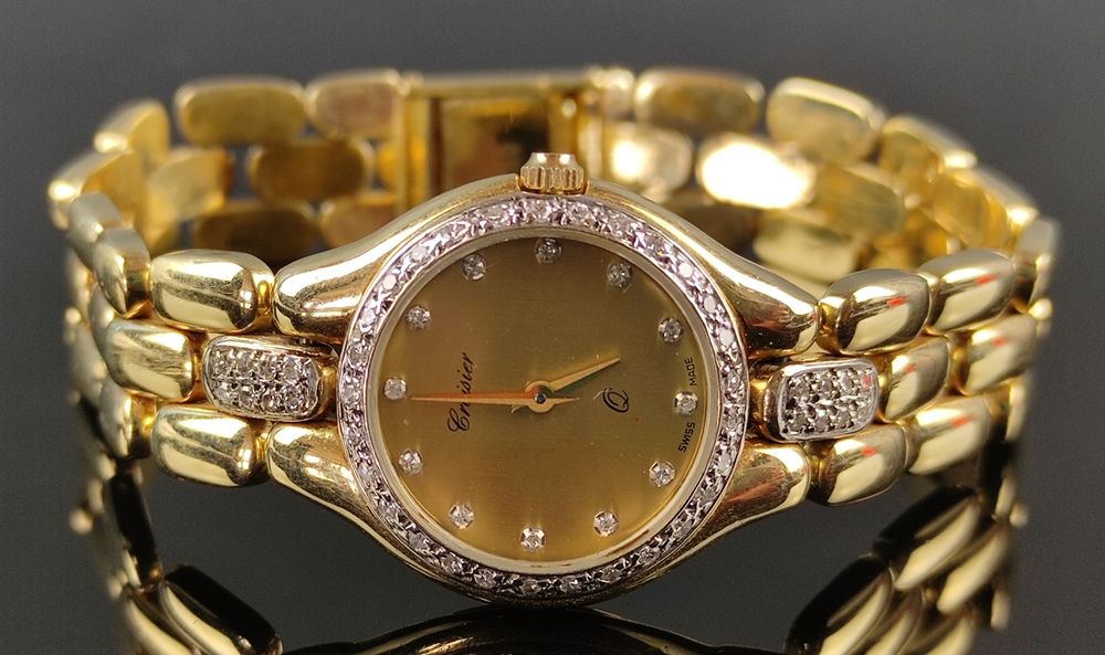 Null 女士腕表，Croisier，石英机芯，表圈镶嵌小钻石，直径23毫米，表带上还有16颗小钻石，585/14K黄金，长18厘米，重36.5克。