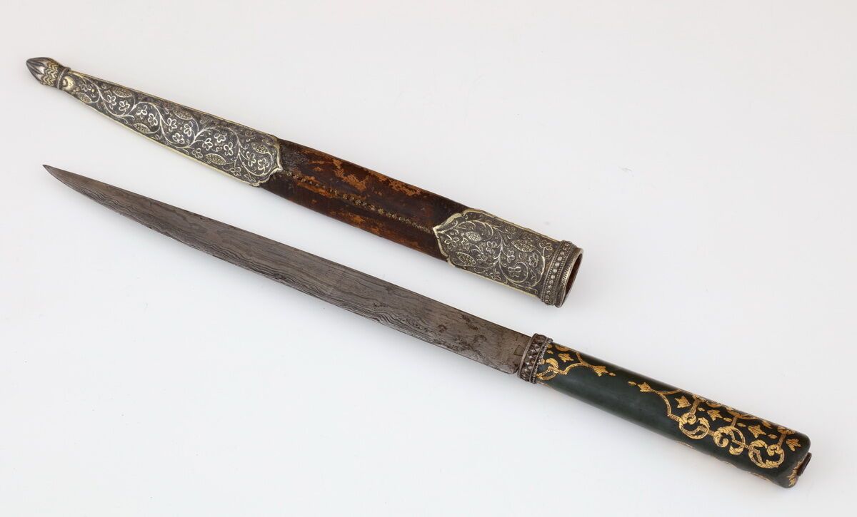 Null Ottoman DAGUE
Turkey, 19th Century
Straight steel blade with wavy damascus
&hellip;