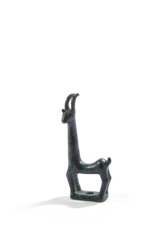 Null Statuette on a rectangular base representing a stylized caprid with a long &hellip;