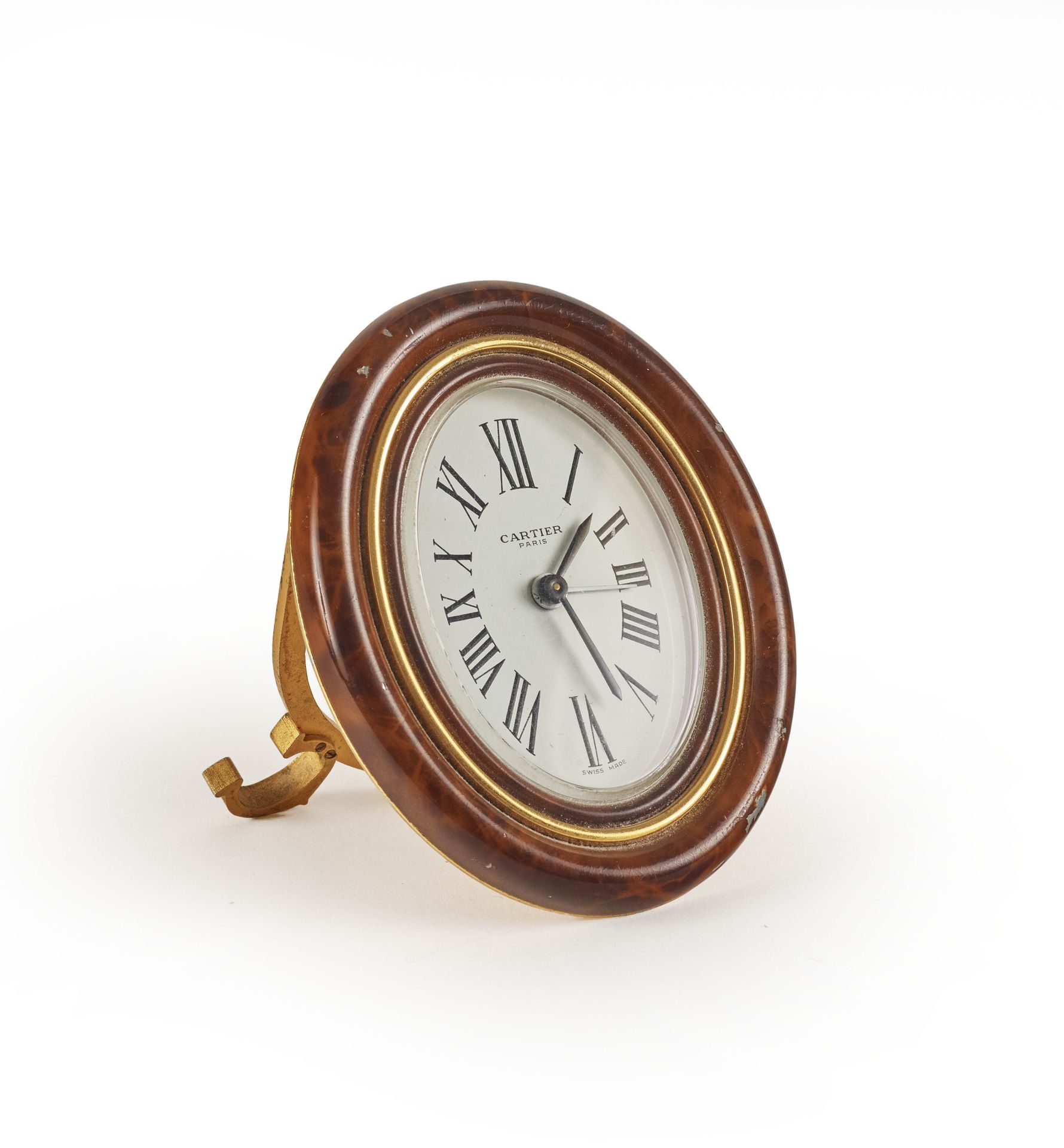 Null 巴黎卡地亚公司

鎏金黄铜和仿玳瑁组成的小台闹钟

H.9厘米

(薯片，原样)