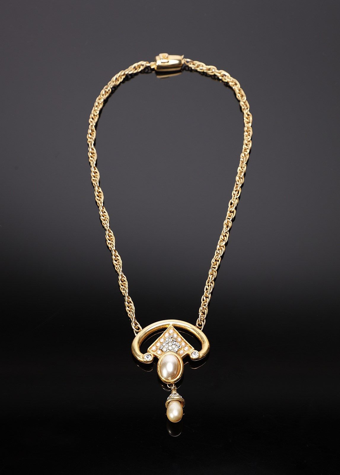 PIERRE CARDIN Golden necklace with an artificial pearl pendant and rhinestones. &hellip;