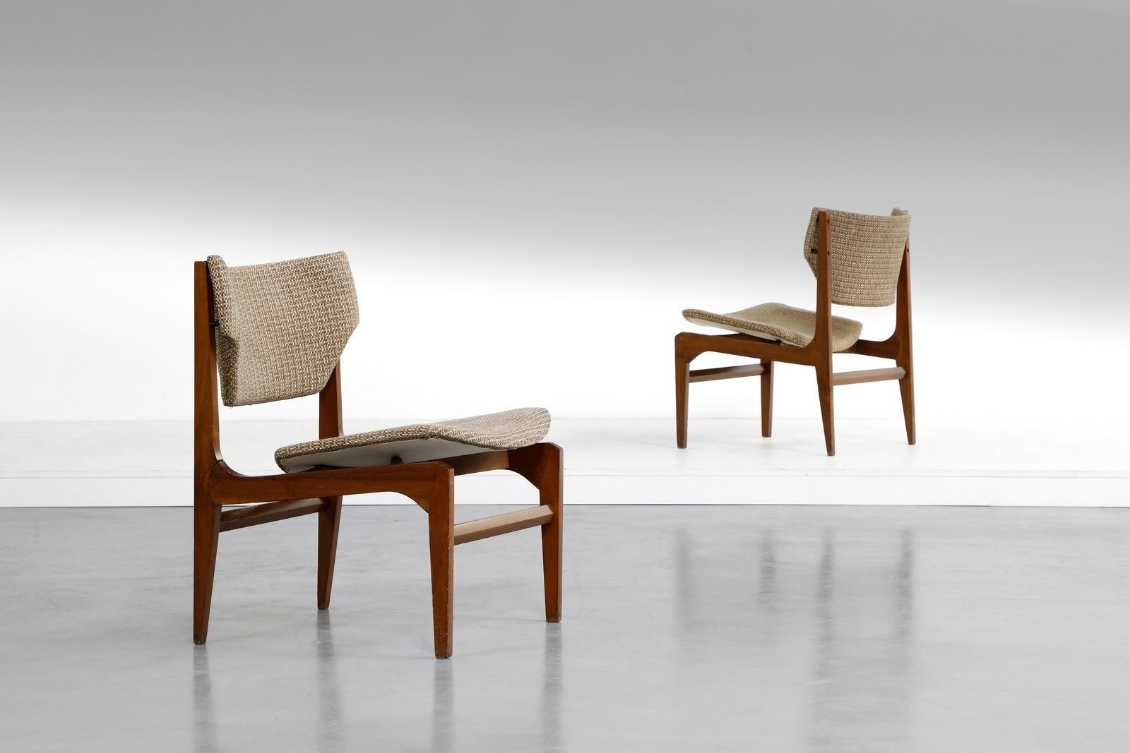 MANIFATTURA DANESE MANIFATTURA DANESE Pair of armchairs. Teak wood and upholster&hellip;